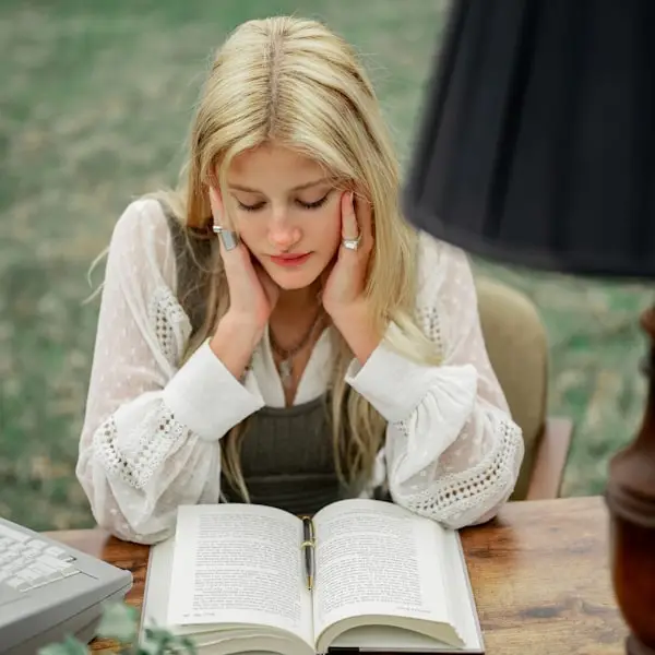 Hotel guest relaxing with a book