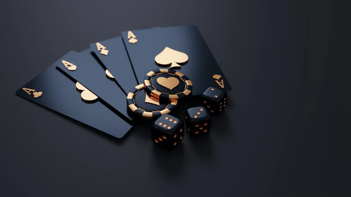 Playing cards with black casino chips